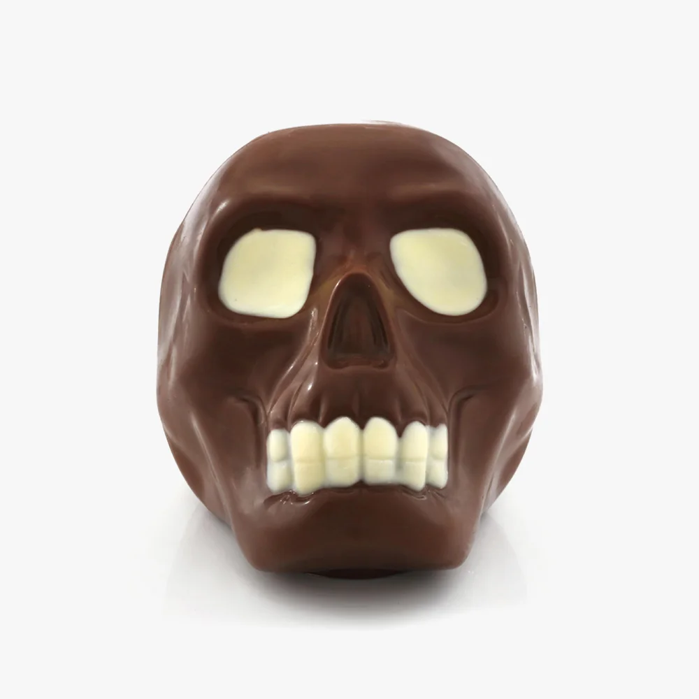 Skull Notre crâne en chocolat et son allure effrayante est parfait pour une touche de frisson sucré. Oserez-vous croquer dedans ? 1 Skull