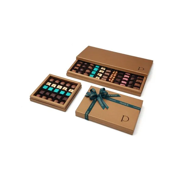 Pralinor Artisan Chocolatier Artisan Chocolatier Maroco-Belge depuis 40 ans PRESTIGE TRIO Ter