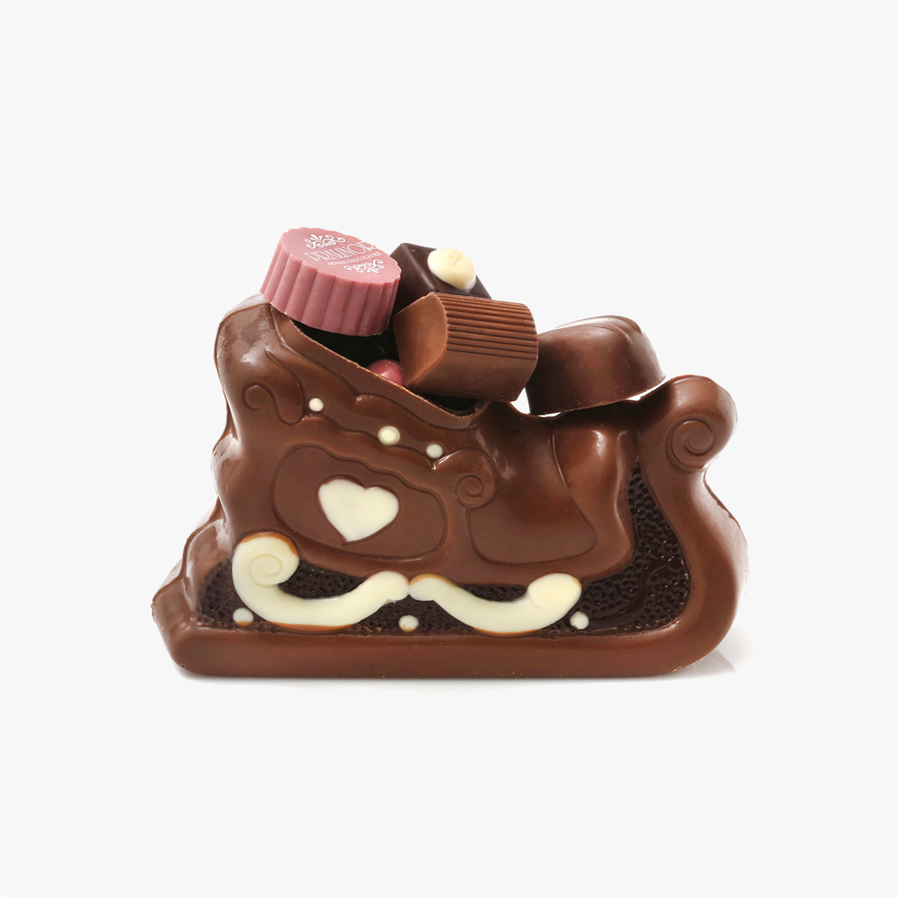 Traineau de Noel Traineau de noël en chocolat garni d'un assortiment de <strong>250g</strong> de chocolats 1 Traineau de Noel