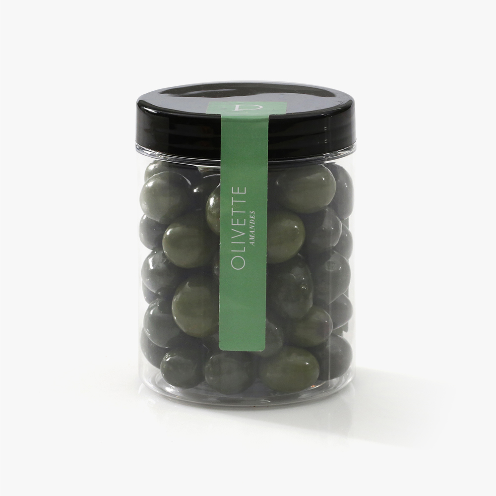 Olivette Pot de 200g. L’olive, symbole de la Provence, a donné naissance à l’olivette en chocolat pour la confiserie. Il s'agit d'amandes torréfiées enrobées de chocolat noir et d'une fine couche de chocolat blanc. 1 Olivette